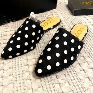 Black polka dot flats. Size 9. Never Worn. New in box.